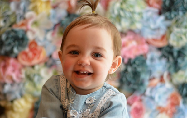 Baby at Flower Wall